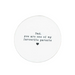 Round white card with text on a white surface