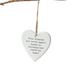 Heart-shaped hanging ornament with a quote on a white background