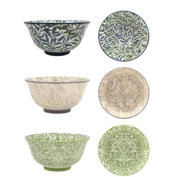 Collection of ceramic bowls and plates with floral patterns on a white background