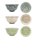 Collection of ceramic bowls and plates with floral patterns on a white background