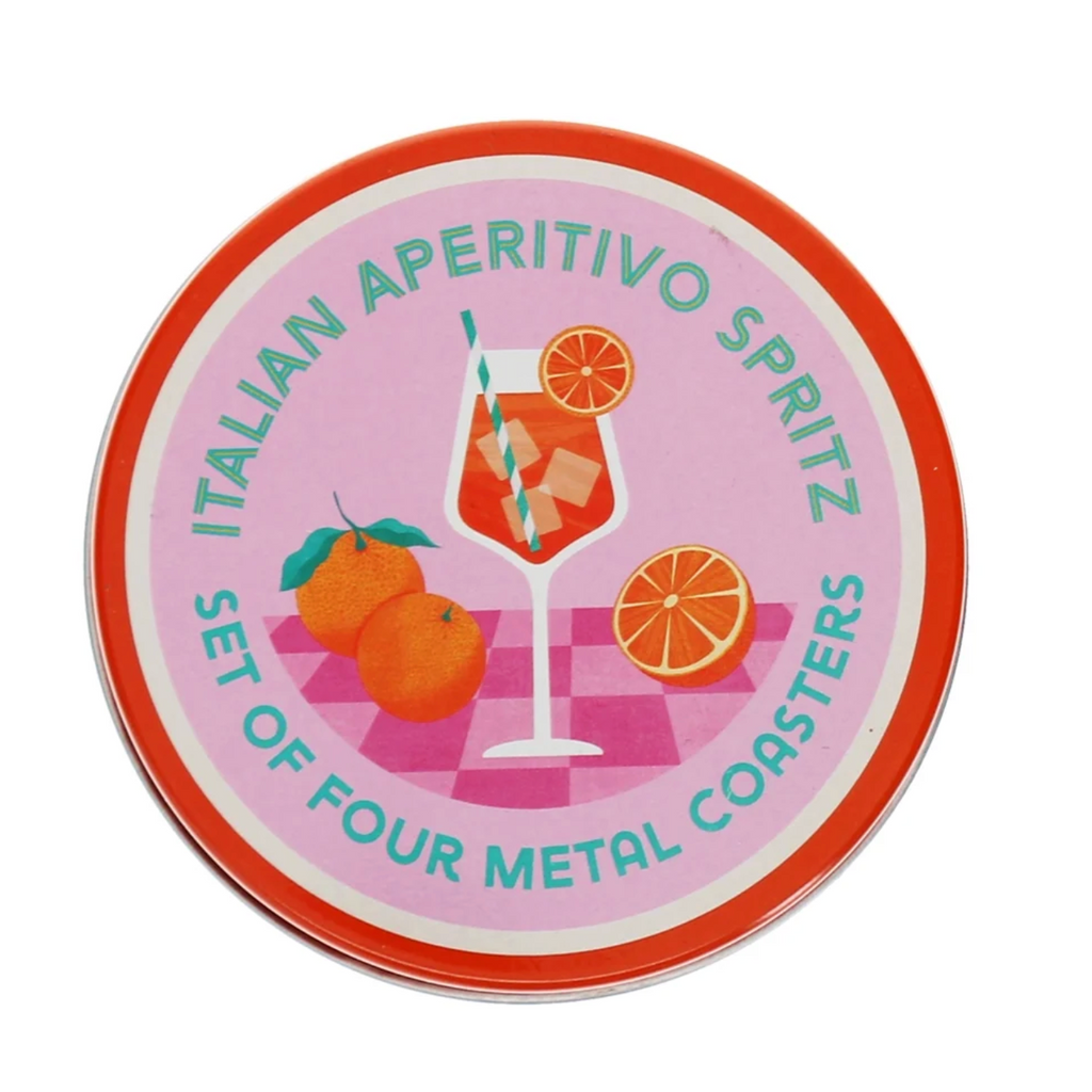 A round metal coaster set packaging or cover design featuring the text 'ITALIAN APERITIVO SPRITZ' and 'SET OF FOUR METAL COASTERS' around an illustration of an orange cocktail glass, two oranges, and an orange slice on a pink background with a red-orange border.