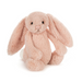 A soft plush bunny toy in a pale blush pink color, sitting on a clean white background.