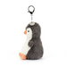 Plush penguin keychain on a white background