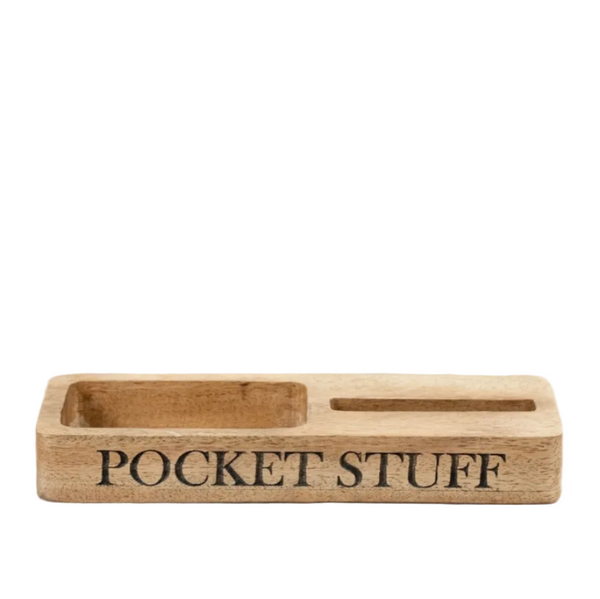 Wooden tray with 'POCKET STUFF' engraving on a white surface