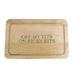A rectangular wooden cutting board with rounded corners and a raised rim, featuring the engraved text 'OFF MY TITS ON PICKY BITS' in dark lettering.