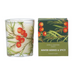 A scented candle in a clear glass jar with a winter berries and spice botanical print, shown next to its green and olive packaging box by Gisela Graham London.