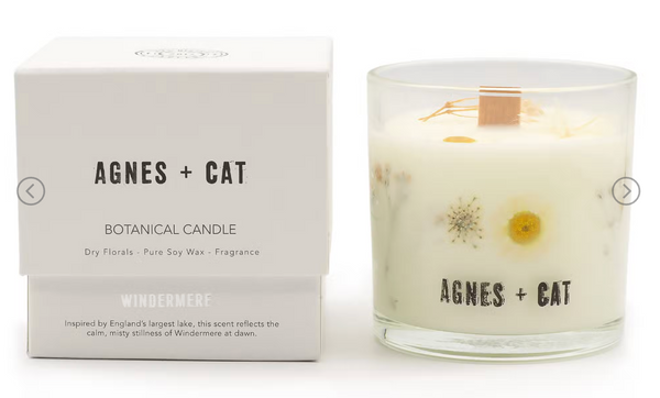 Agnes + Cat botanical candle with packaging on a white background
