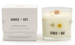 Agnes + Cat botanical candle with packaging on a white background