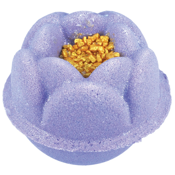 Purple bath bomb with gold on a white background