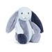 Plush toy rabbit with gray and white fur on a white background