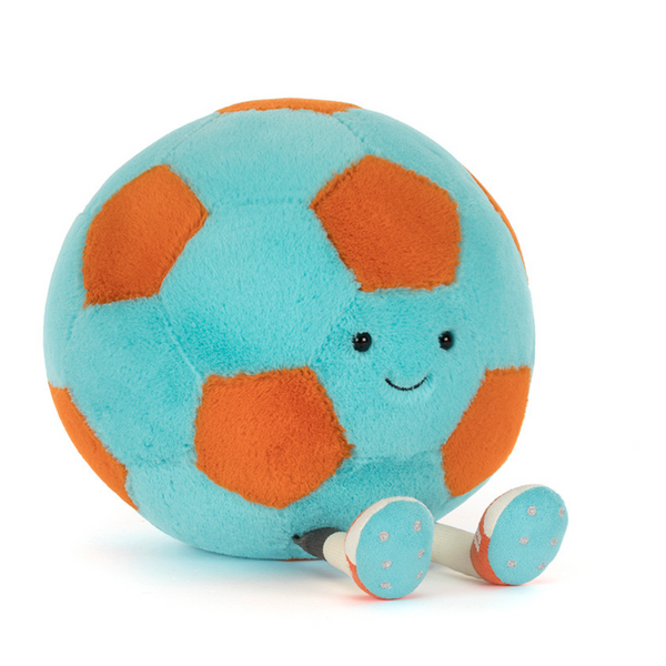 Plush toy soccer ball with a smiling face on a white background