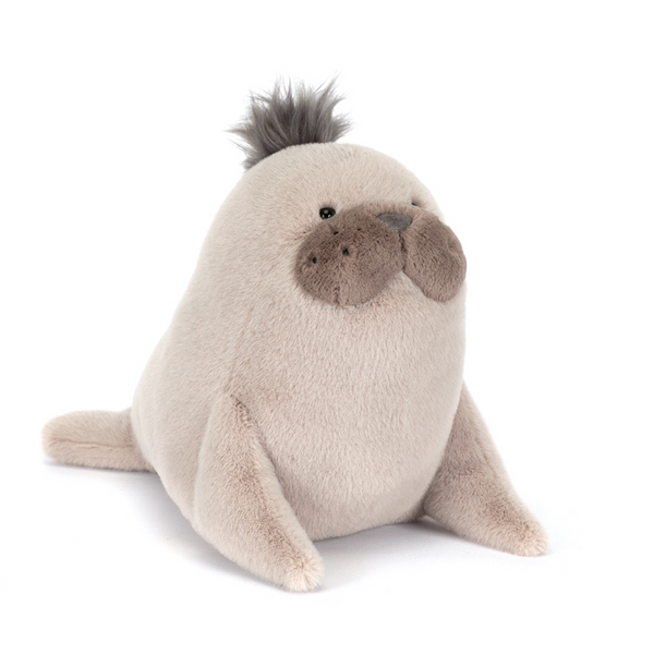 Plush toy seal on a white background