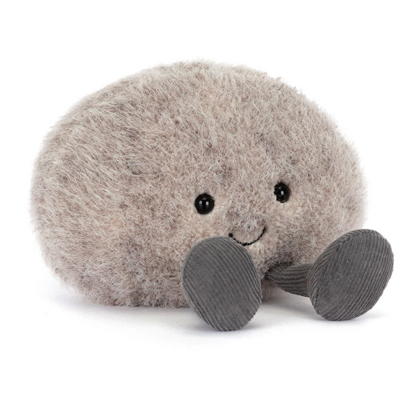 Plush toy resembling a pebble on a white background