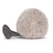 Grey fluffy pebble with legs on a white background