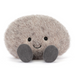Plush toy pebble on a white background