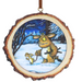 A circular wooden slice ornament featuring a hand-painted illustration of Truffo and a small mouse in a snowy night scene, with a brown hanging loop at the top, shown on a plain white background.