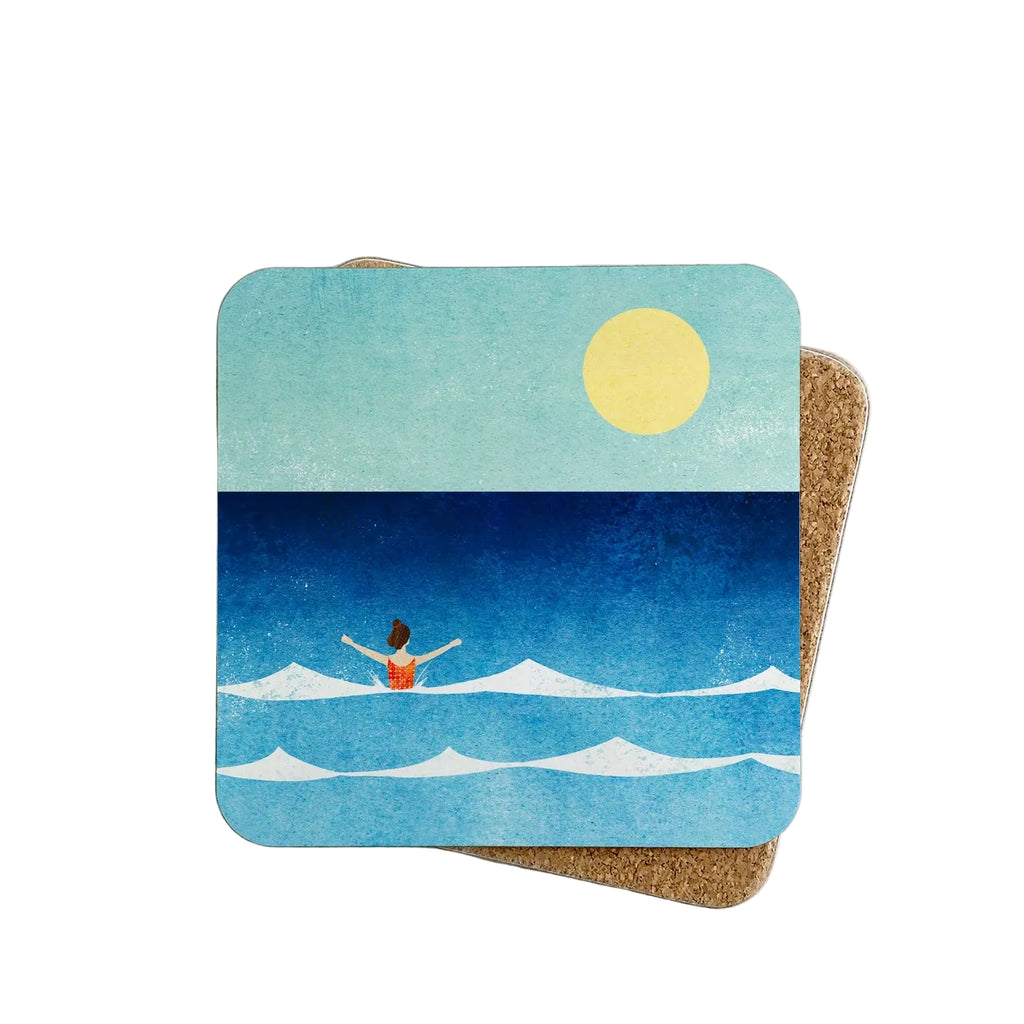 A square cork coaster with rounded corners featuring a stylized illustration of a person in a small orange boat on blue ocean waves under a pale blue sky with a yellow sun, placed on a white background.