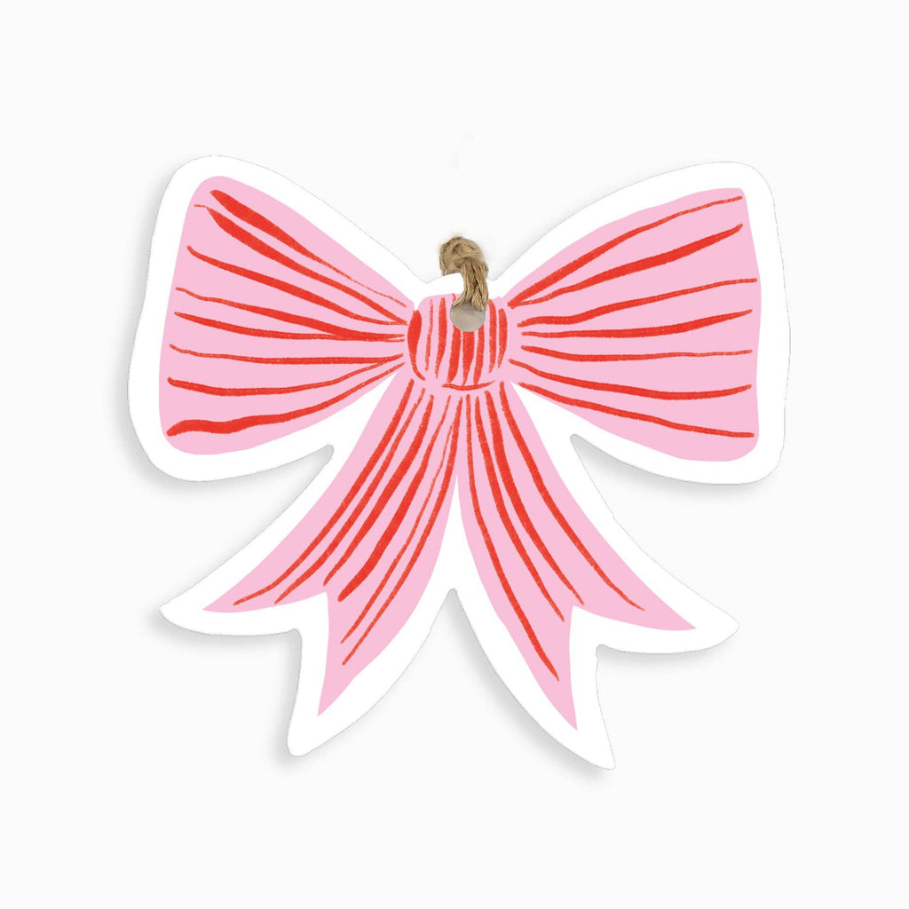 Pink bow with red stripes on a white background