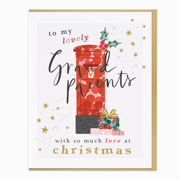 A square greeting card with a white background and a thin gold border, featuring a festive illustration of a red patterned jar filled with ornaments and a small gift box, with the text 'to my lovely Grand parents with so much love at Christmas'.