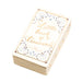 Small book titled 'Little Book of Treasures' with decorative cover on a light background