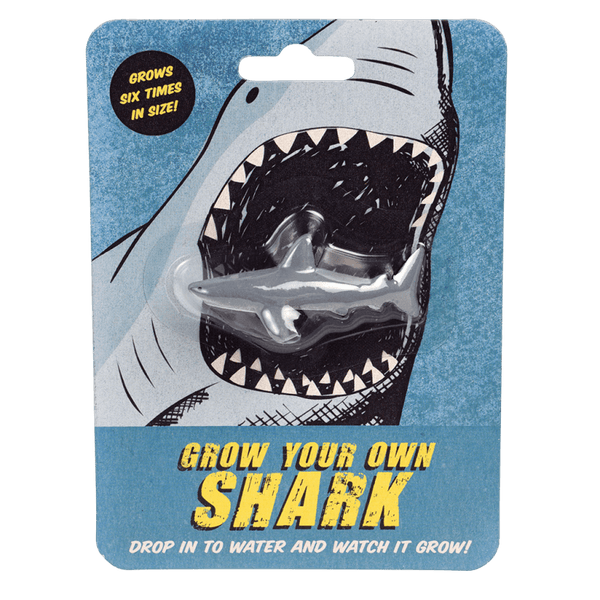 Packaging for 'Grow Your Own Shark' kit with shark illustration and text on a blue background