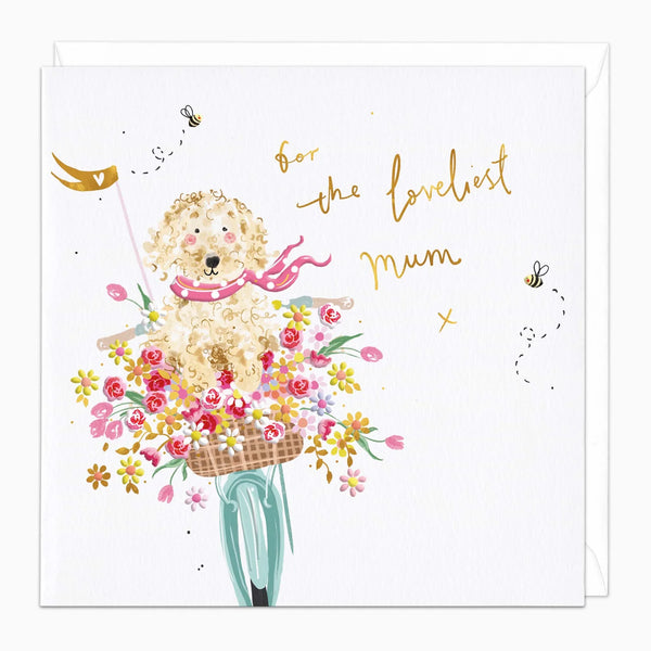 Greeting card with a dog riding a bike, flowers, and 'For the loveliest mum' text on a white background.