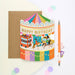 Mrs Best Paper Co. carousel shaped birthday card with gold foil accents, featuring a bus, taxi, tiger, and horse.