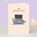 Mrs Best Paper Co. birthday card featuring a grey cat lying on a laptop keyboard with funny text on a peach background