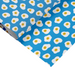 Mrs Best Paper Co. matte gift wrap featuring a blue background with a repeating pattern of cute smiling fried eggs.