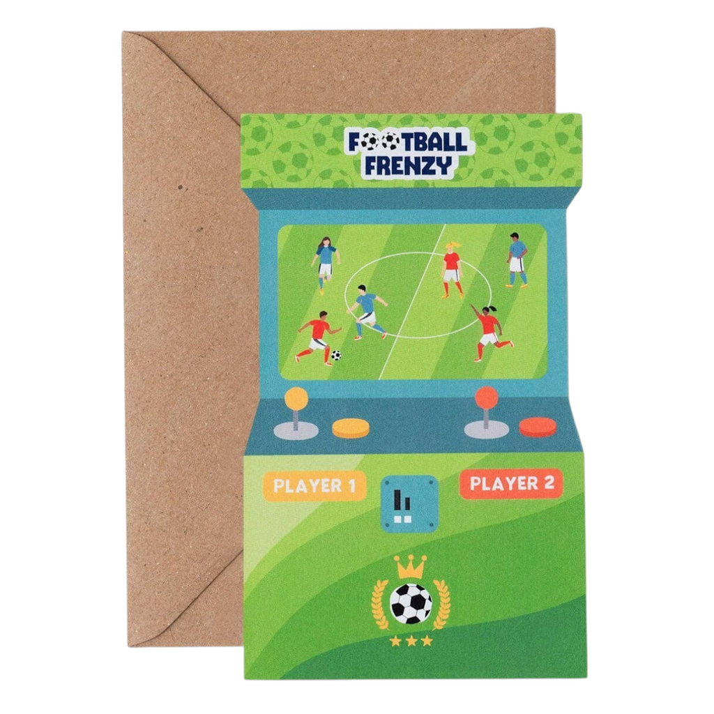 Mrs Best Paper Co. Football Frenzy arcade game shaped birthday card with a recycled kraft envelope on a desk.