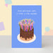 Mrs Best Paper Co. birthday card with a chocolate cake illustration and many lit candles on a blue background.