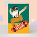 Mrs Best Paper Co. birthday card featuring a cartoon grandpa on a skateboard, wearing sunglasses and a cap.