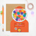 Mrs Best Paper Co. gumball machine shaped birthday card with colourful smiling gum balls and a kraft envelope