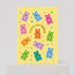 Mrs Best Paper Co. Mifkins gummy bear birthday card with pastel bears, gold foil text, and scalloped yellow edges.