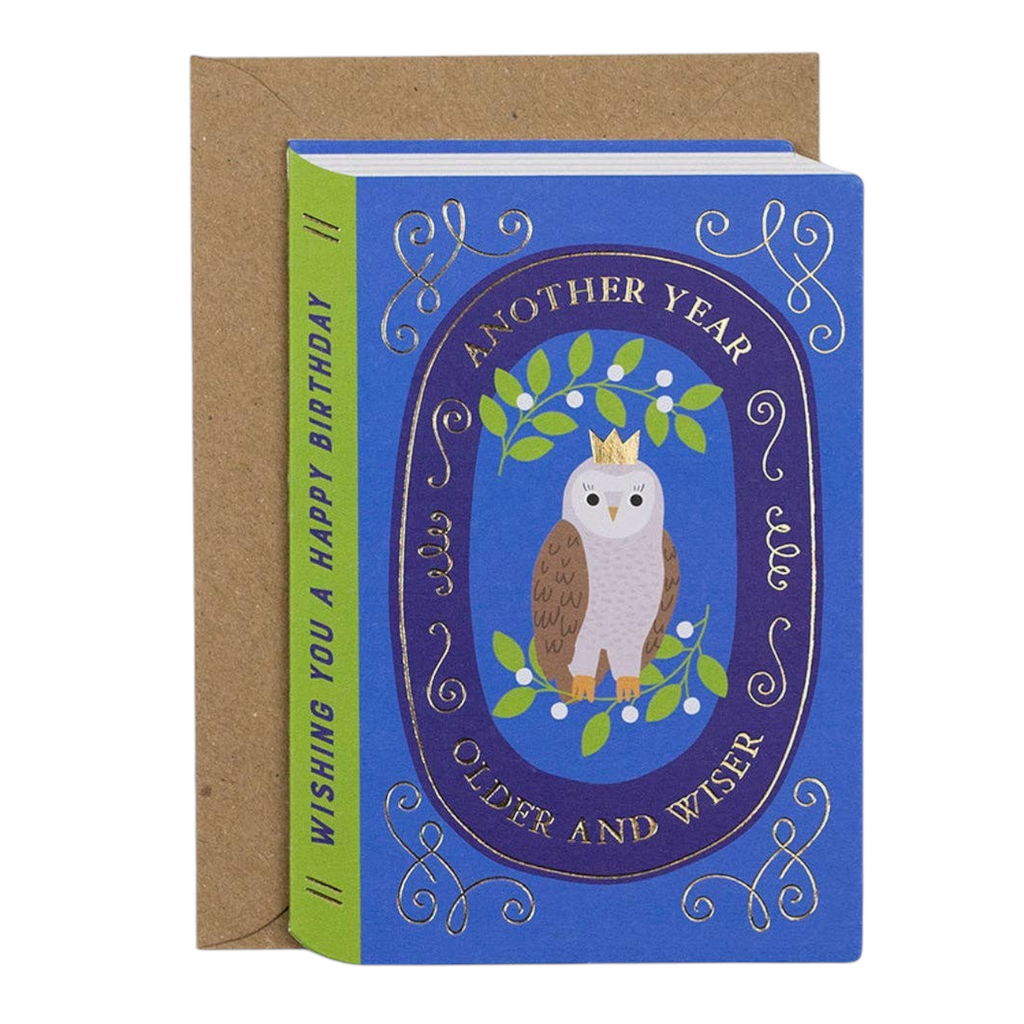 Mrs Best Paper Co. blue storybook birthday card featuring a wise owl with gold foil details and a kraft envelope.