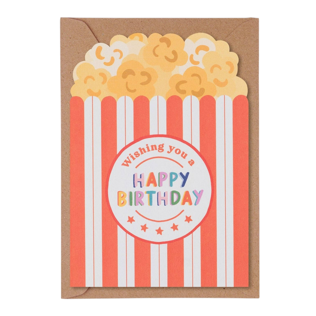 Mrs Best Paper Co. popcorn-shaped birthday card with red and white stripes and a kraft envelope on a blue background.
