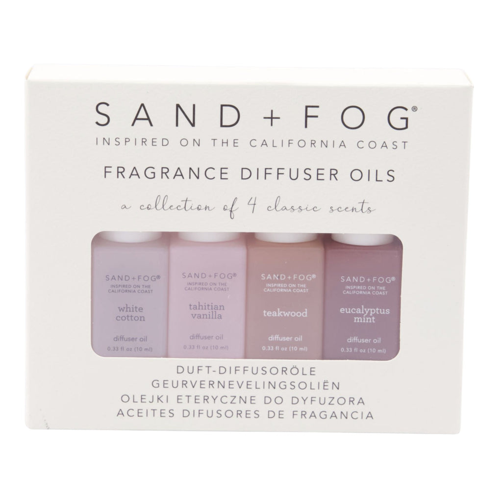 Mrs Best Paper Co. Sand + Fog 4-pack fragrance diffuser oils featuring White Cotton, Tahitian Vanilla, Teakwood, and Eucalyptus Mint scents in 10ml bottles.