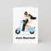 Mrs Best Paper Co. Studio Boketto wedding card featuring a bride and groom riding a blue scooter, Just Married text.