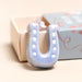 Lisa Angel Tiny Matchbox Ceramic Horseshoe Token