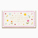 A rectangular greeting card with a scalloped pink border and a message for 'Our Daughter' in gold script, decorated with small colorful flowers and stars on a cream background.