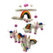 A colorful handcrafted felt mobile featuring unicorns with rainbow manes, hanging from clouds with a rainbow and pink pom-pom details.