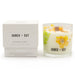 Agnes + Cat botanical candle with packaging on a white background